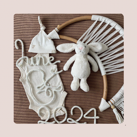 Knitted Baby with Month and Year Sign