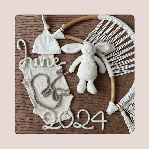 Knitted Baby with Month and Year Sign