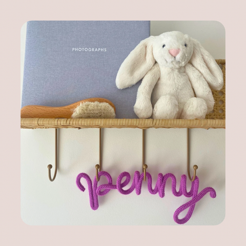 How do I hang a knitted name sign?