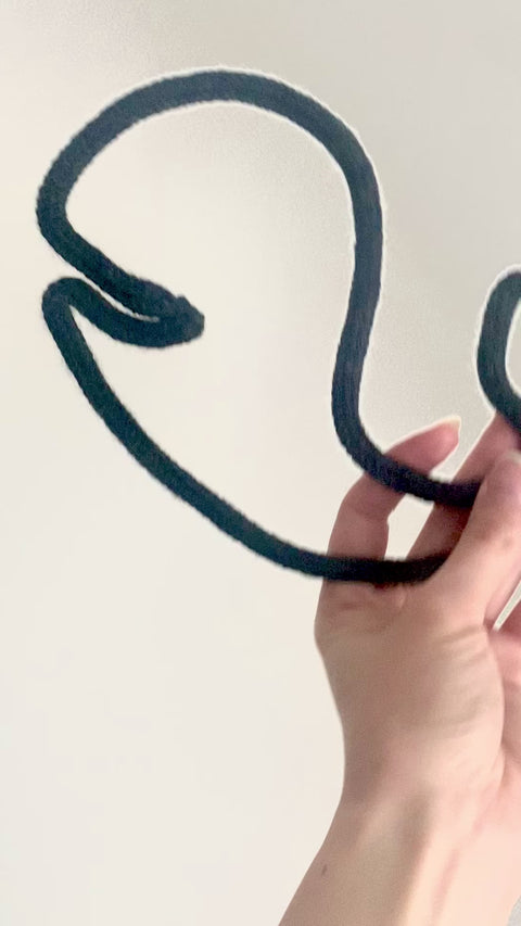 handmade knitted whale sign 